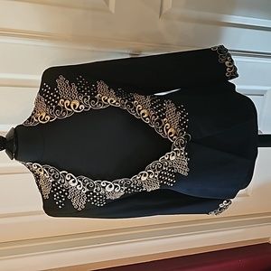 Black and gold dress jacket.  Pit to pit 19".  Very classy.
